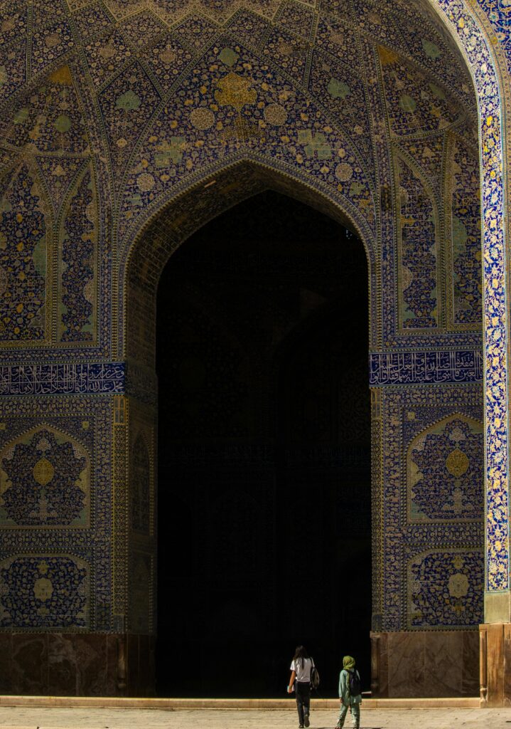 Discover the intricate artistry of Sheikh Lotfollah Mosque's entrance in Isfahan, Iran.